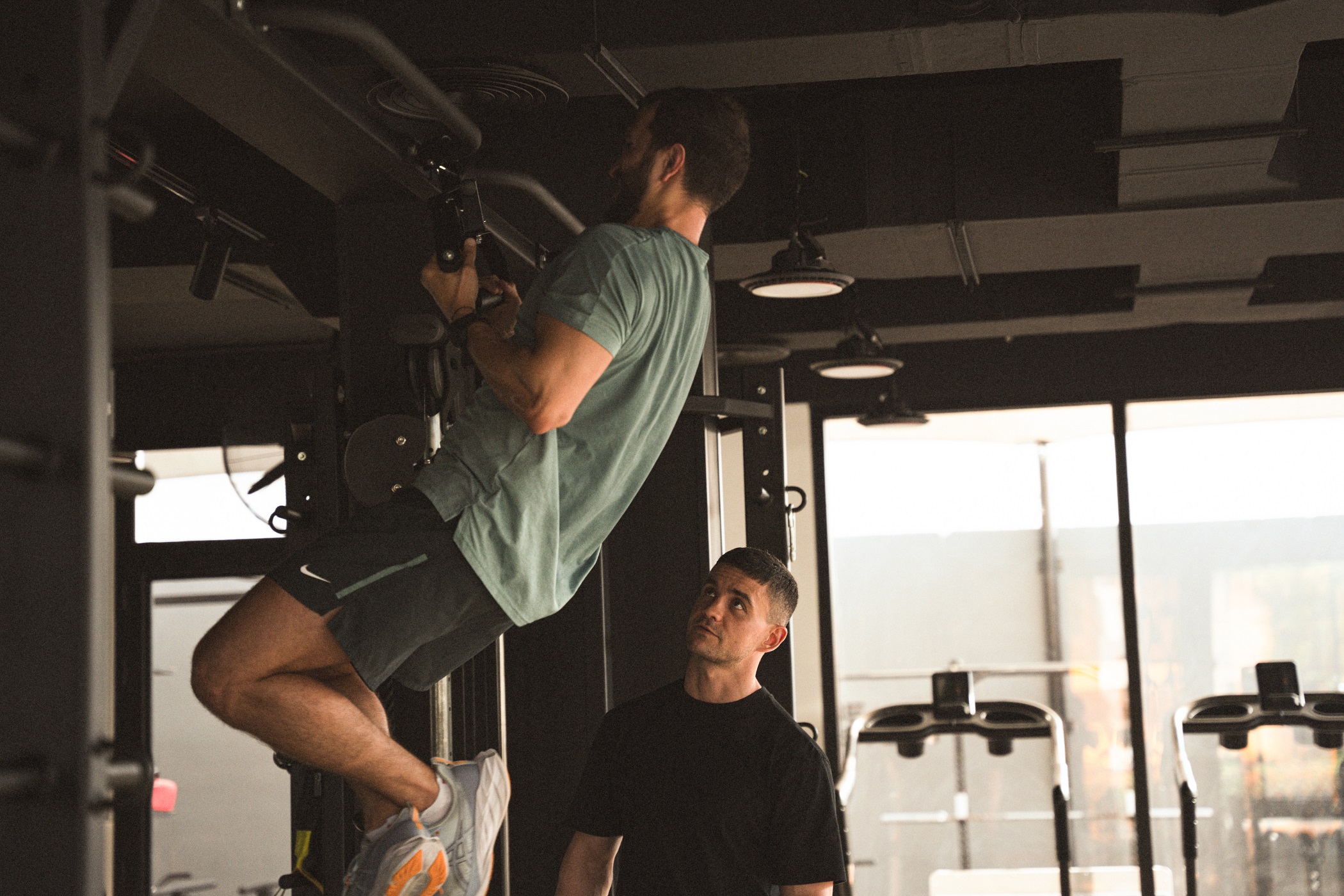A webpage article features a high-resolution photo showing a diverse group of people engaging in heart-healthy exercises like jogging and strength training outdoors, promoting wellness and longevity